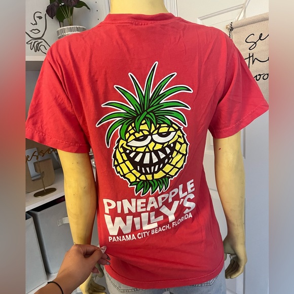 A bright dark pink Pineapple Willy’s t-shirt! - Picture 2 of 5